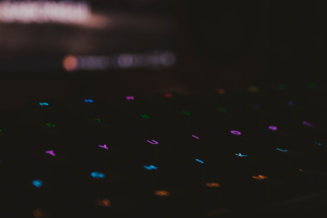 RGB mechanical keyboard on a desk in a dark room