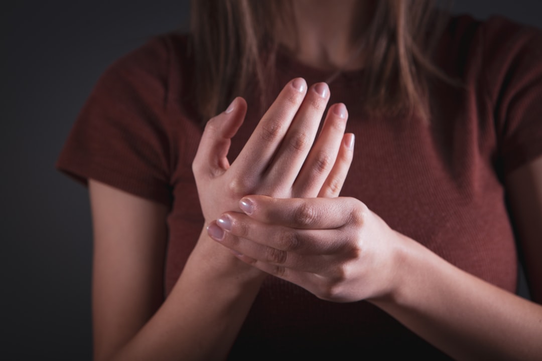 Hand showing wrist pain and strain from computer use