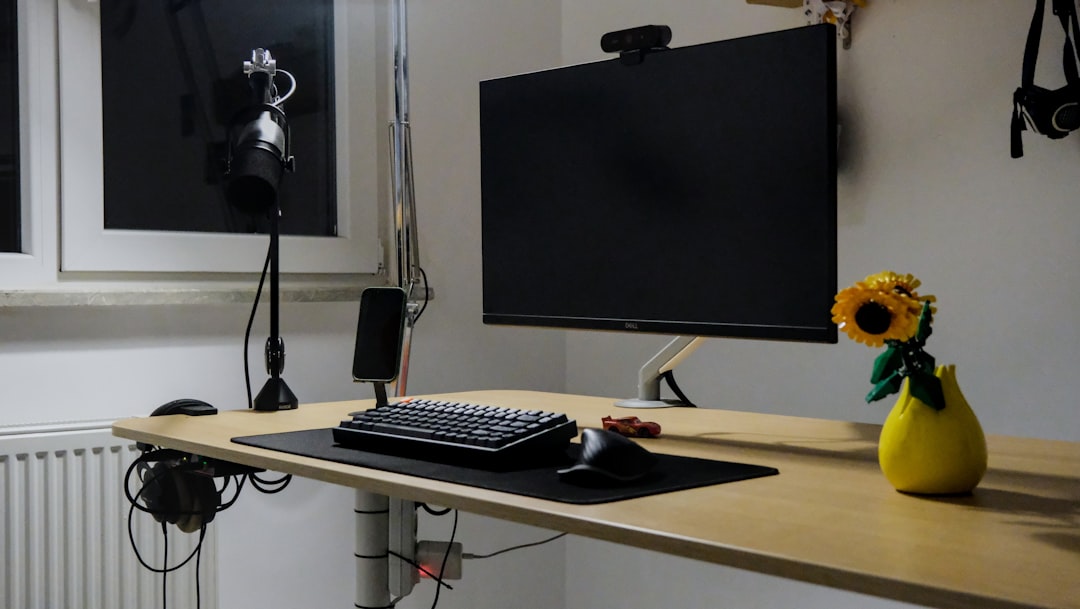 Podcast microphone on desk with recording setup