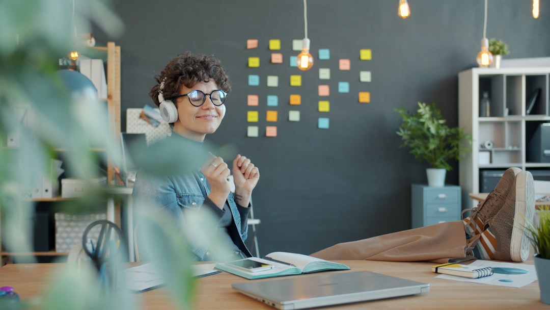 Wireless headphones on modern office desk