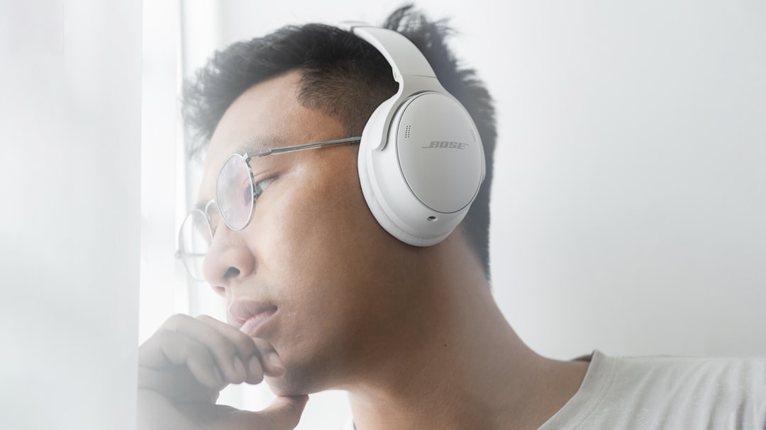Person wearing noise canceling headphones