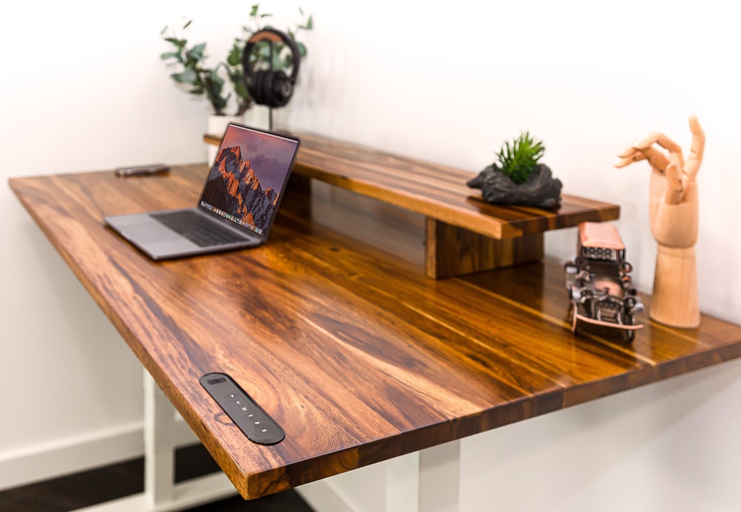 Budget standing desk converter in home office