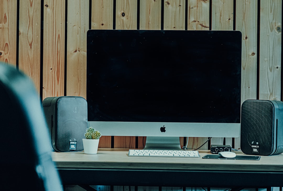 Clean desk setup with monitor and keyboard