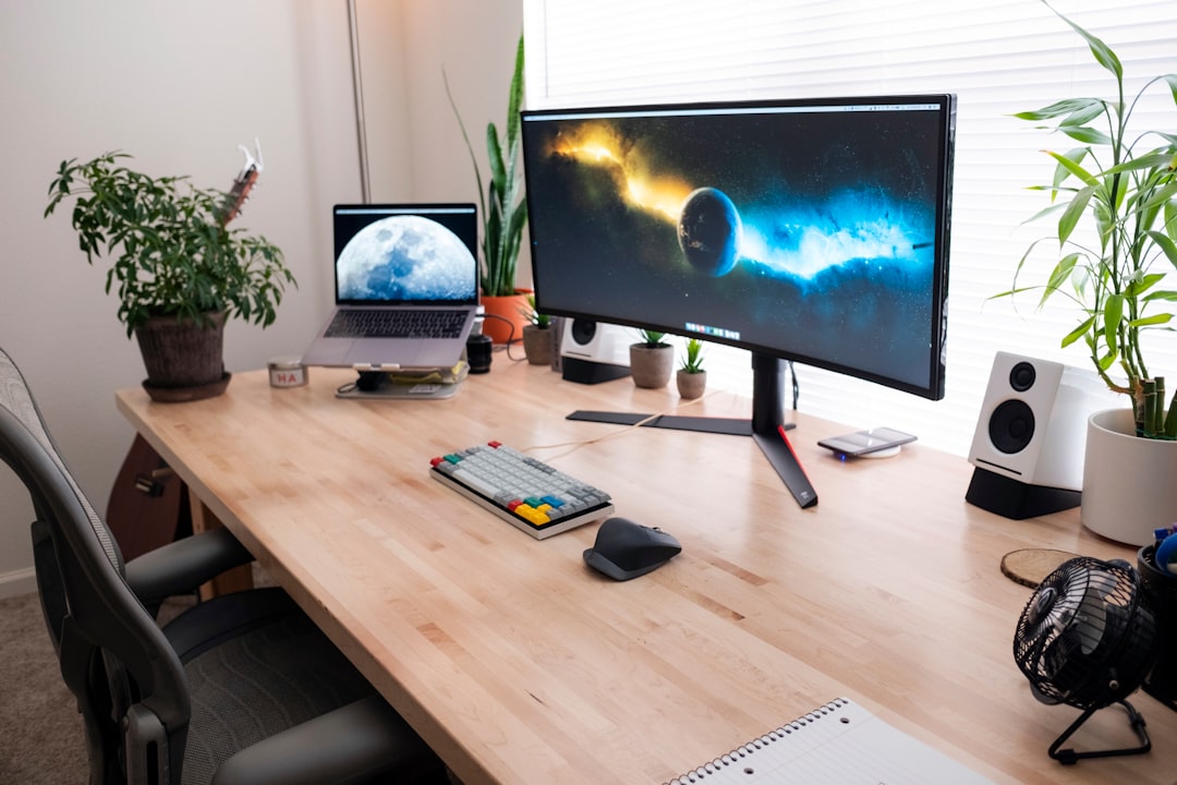 Modern computer monitor on desk workspace
