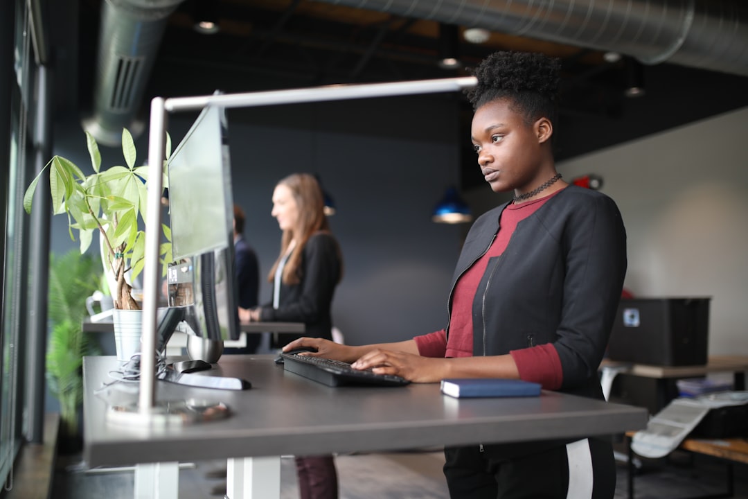Ergonomic desk workspace with monitor arm