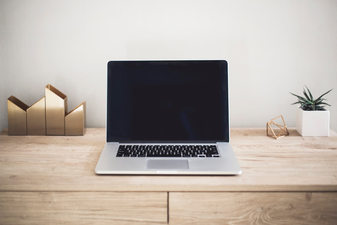 ASUS Zenbook A16 open on desk