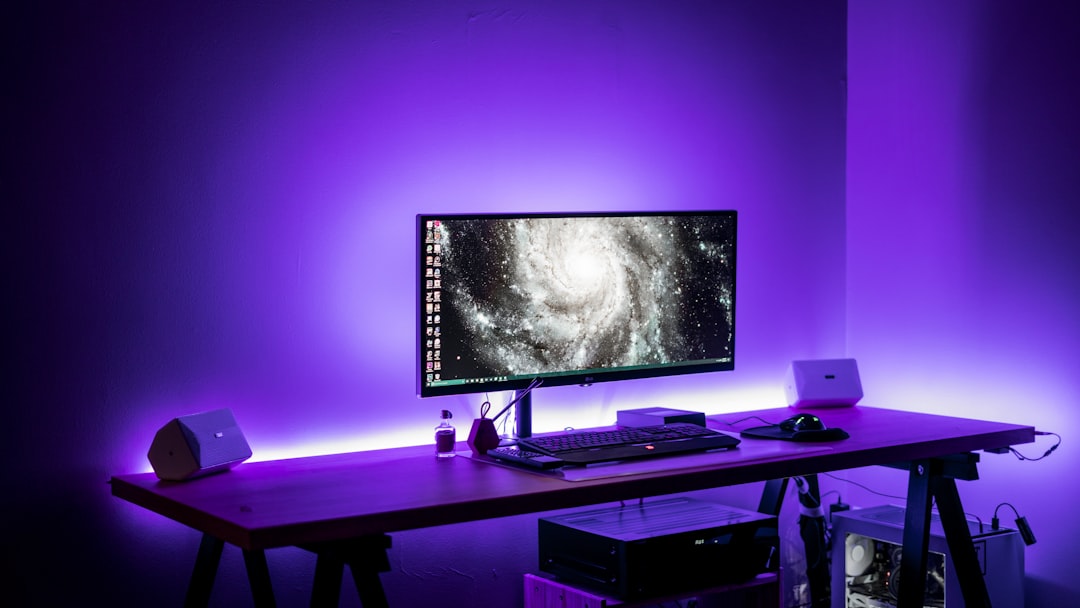 LED strip lights behind monitor providing ambient glow