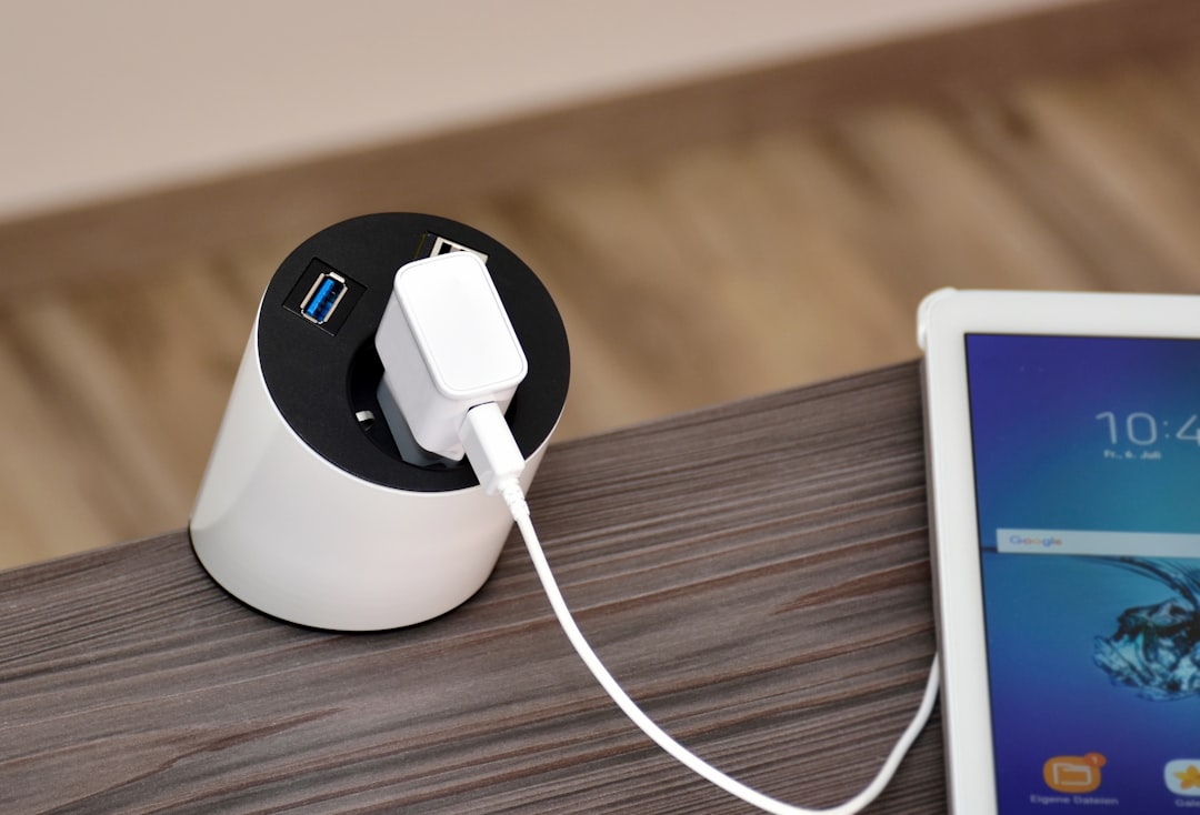 USB charging hub with multiple ports on desk