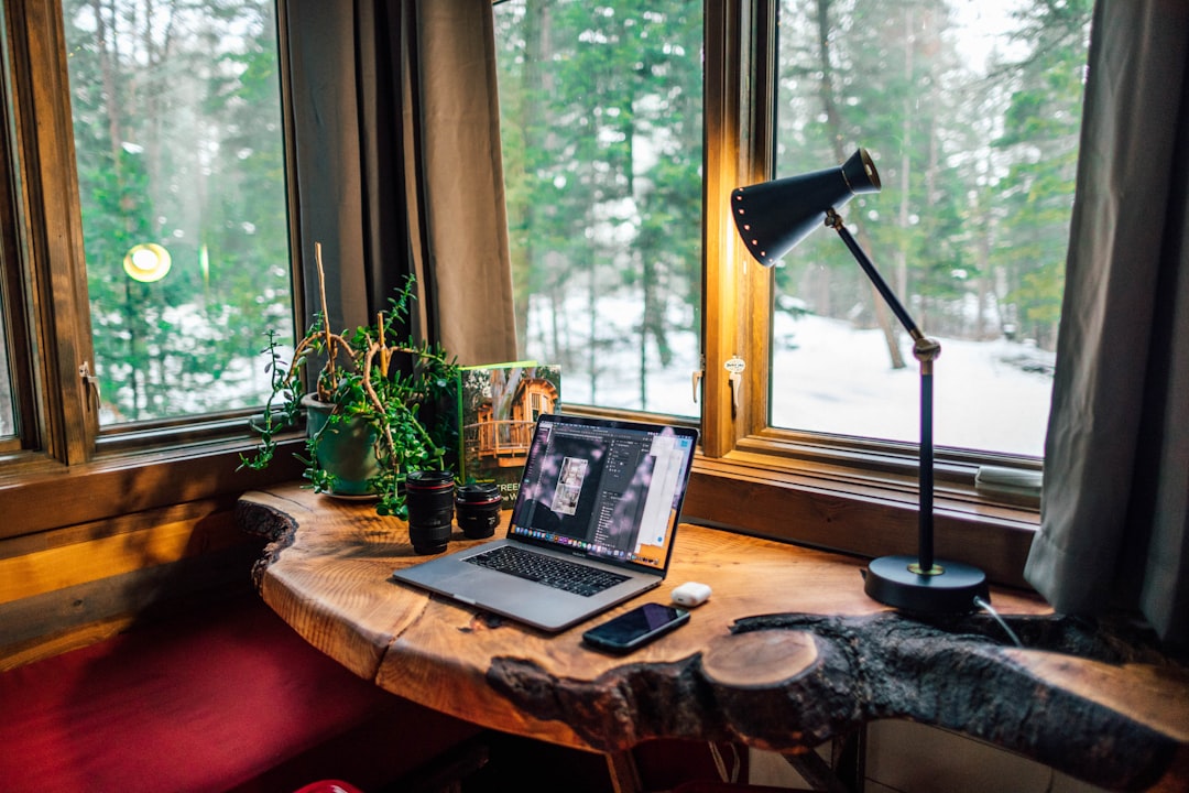 Well-lit home office workspace with warm ambient lighting
