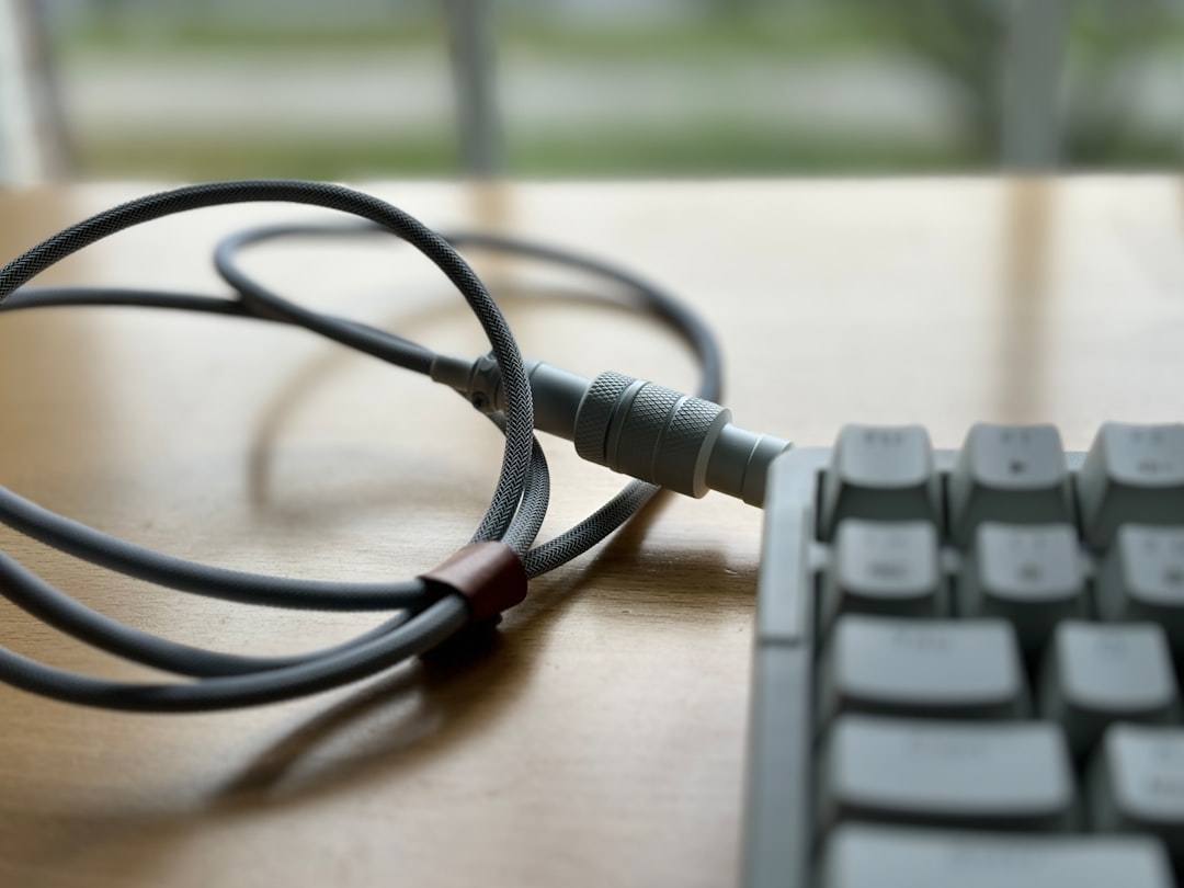 Desk cable management with monitor arm