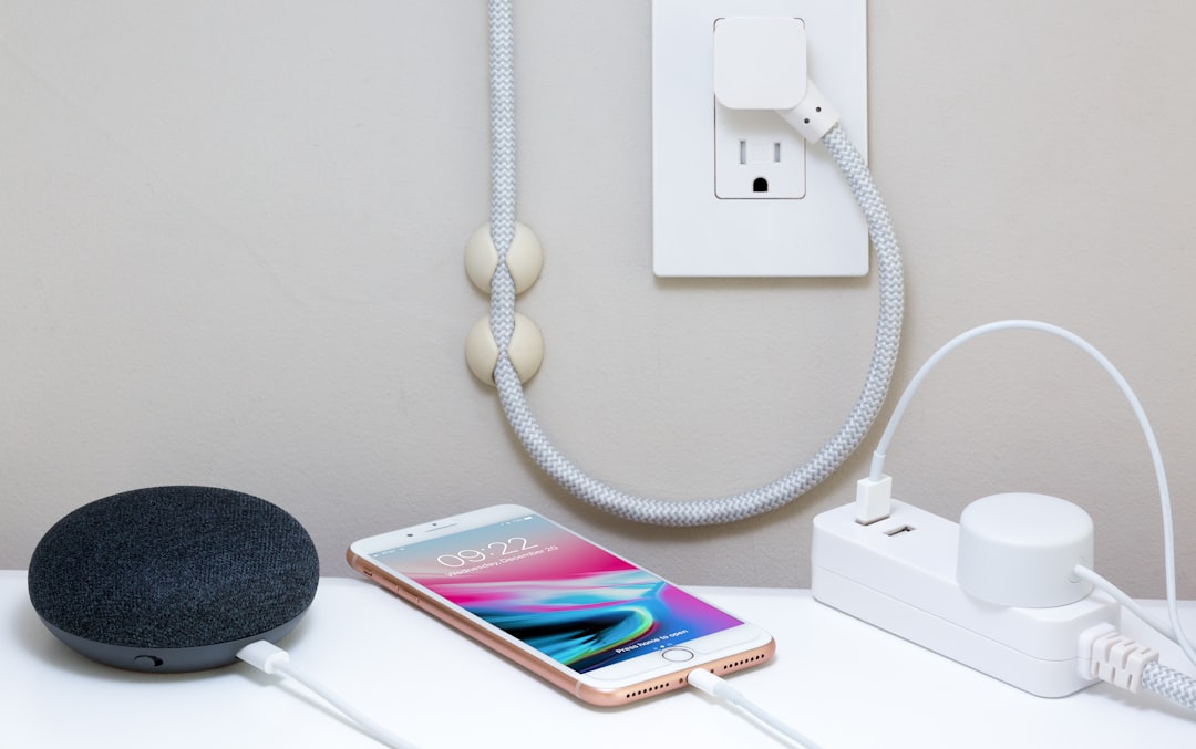 Smart power strip managing cables under desk