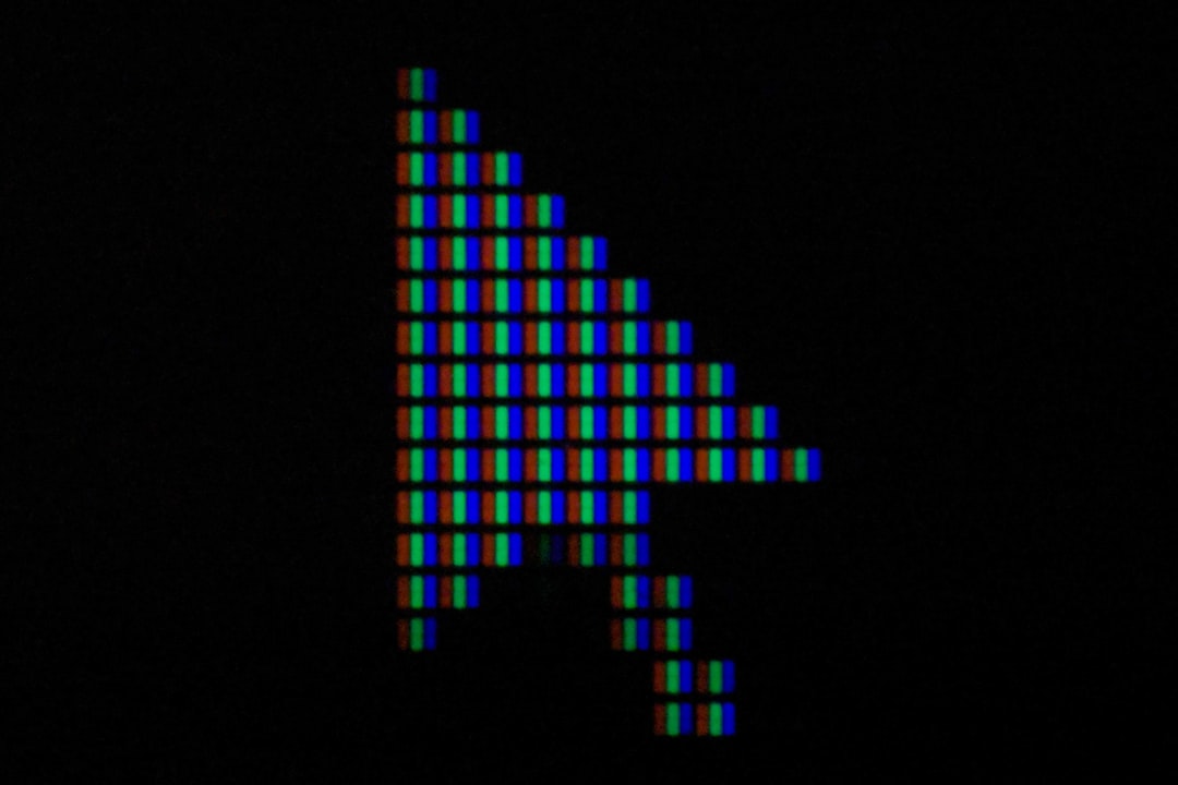 Hand using computer mouse at desk