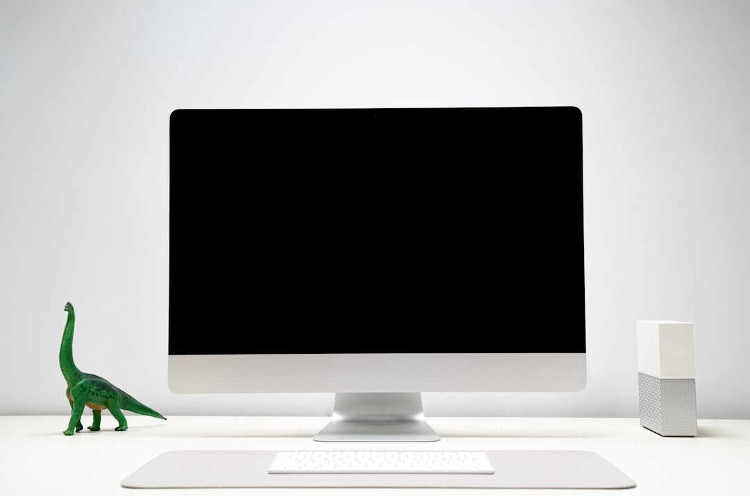 Modern computer monitor on a clean desk setup