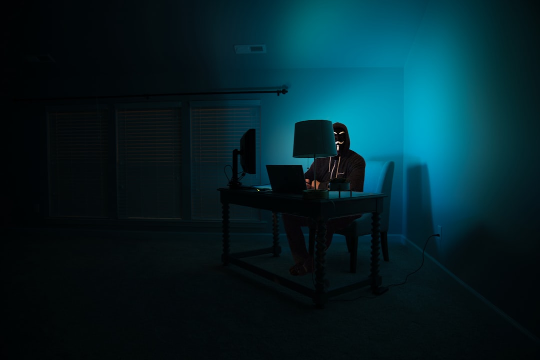 Coding workspace at night in dark room