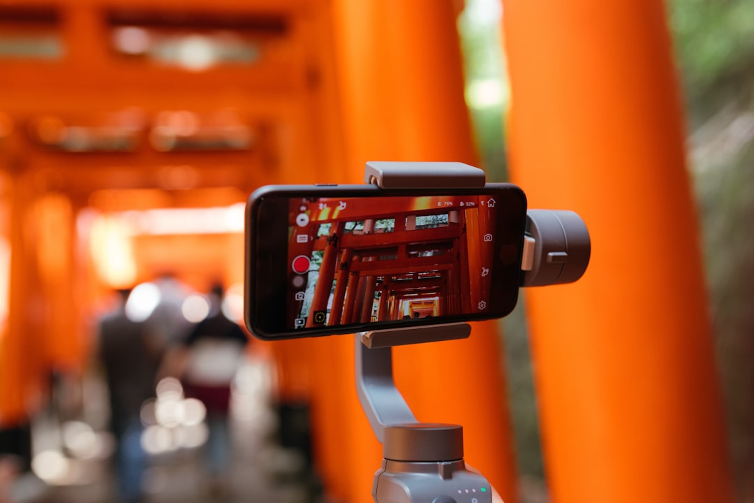 Smartphone mounted on tripod for vlogging and content creation