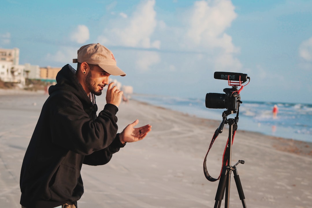 Content creator filming a video segment outdoors