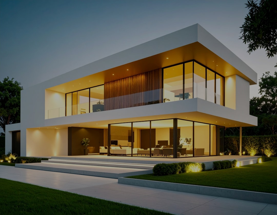 modern house exterior at dusk with outdoor lighting