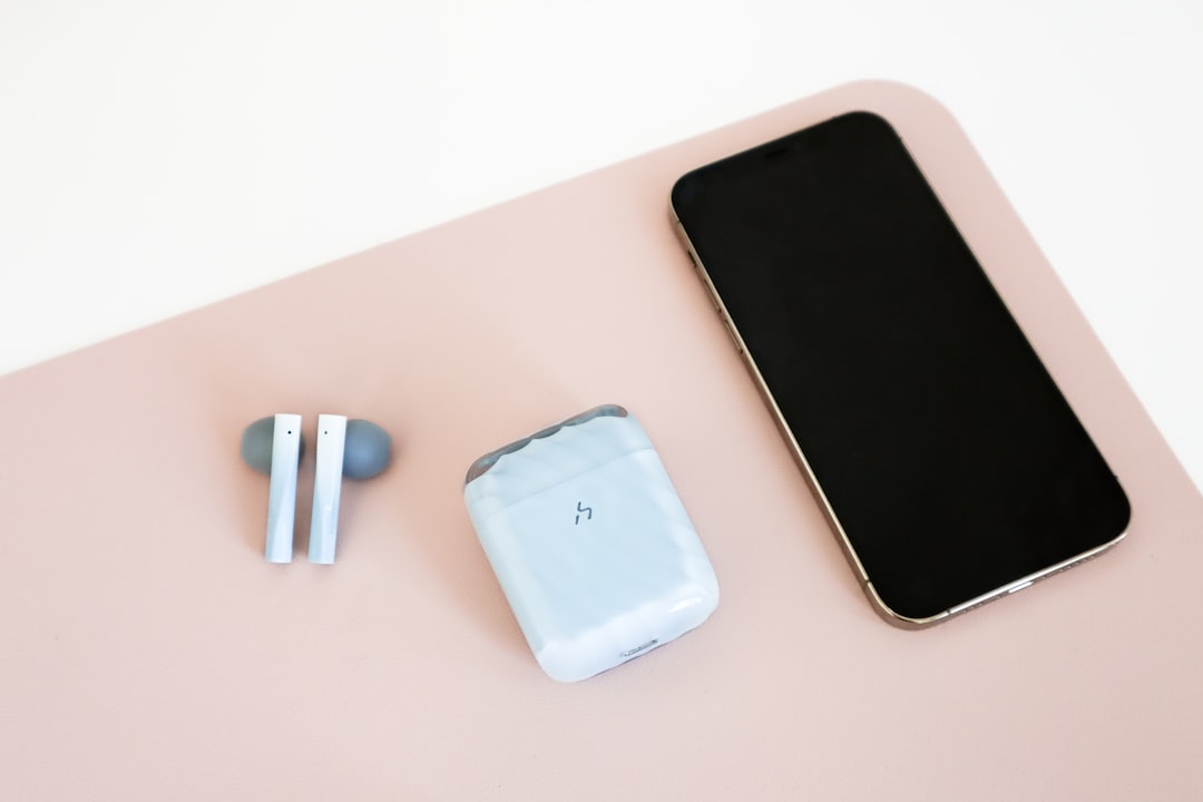 Wireless earbuds on desk for focused work