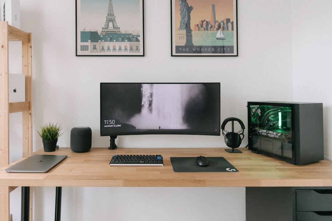 Minimalist desk with laptop on adjustable stand