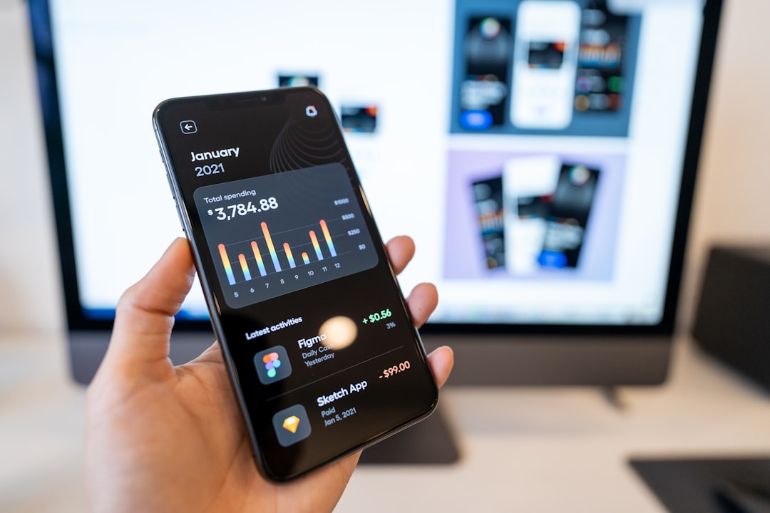 Smartphone showing fitness app data dashboard with health metrics