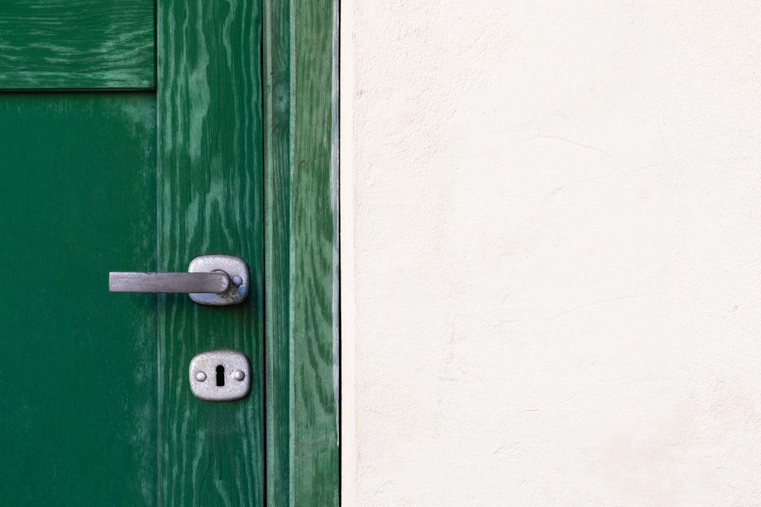 Door handle hardware installation close-up