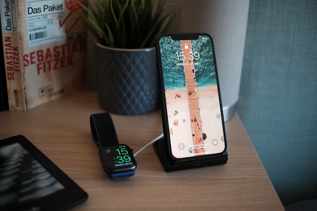 Smartwatch charging on nightstand with cable organized neatly