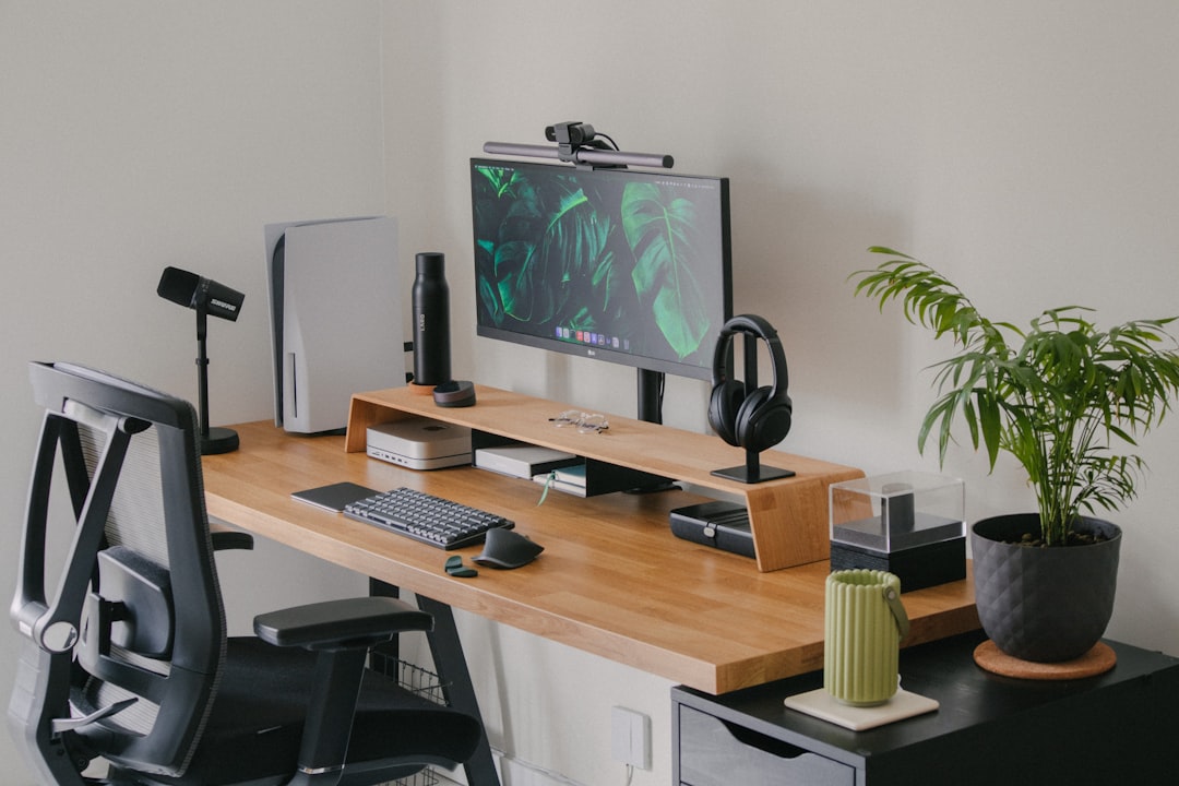 Modern home office with standing desk and clean setup