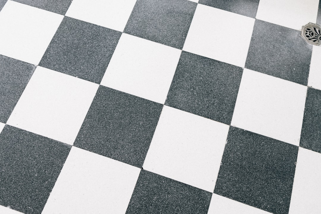 Bare feet on bathroom tile ready to step on scale