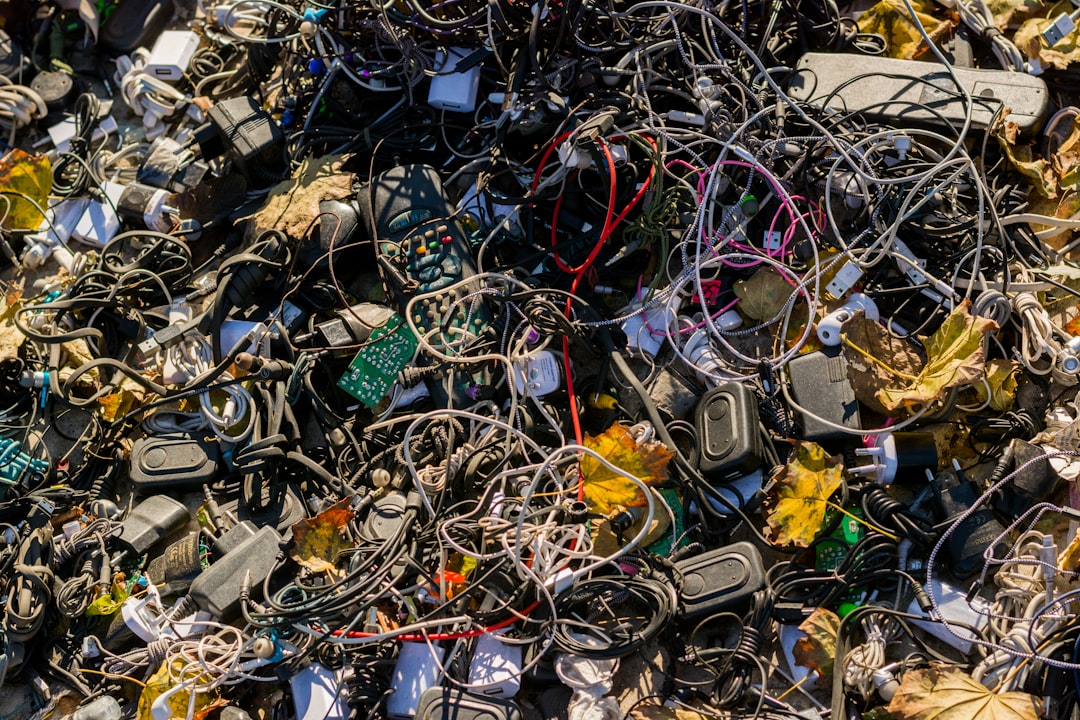 Pile of discarded electronic devices awaiting recycling