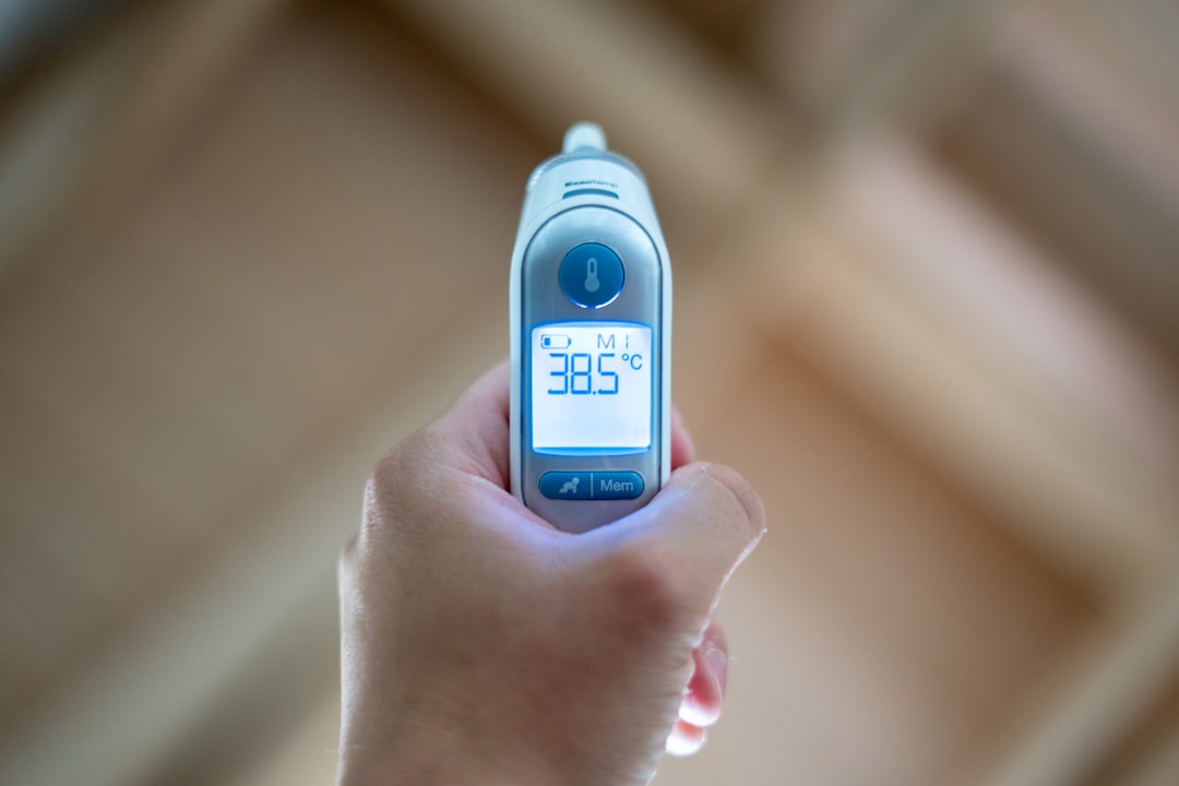 Infrared thermometer gun measuring surface temperature