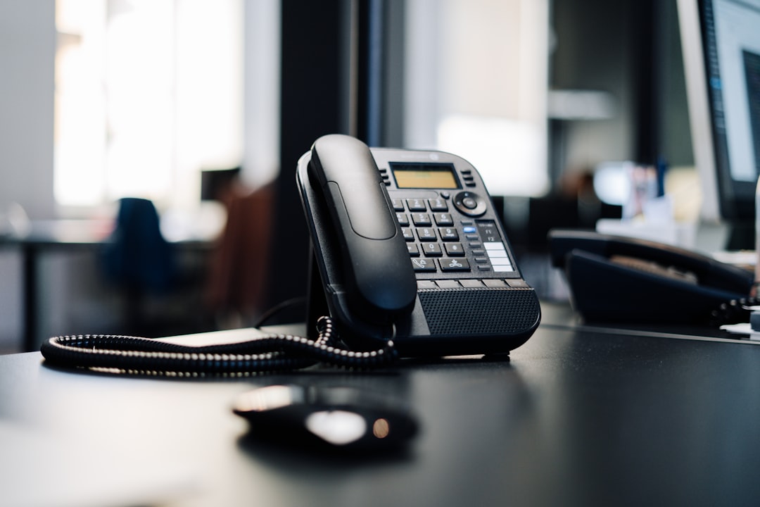 Conference speakerphone device on an office desk