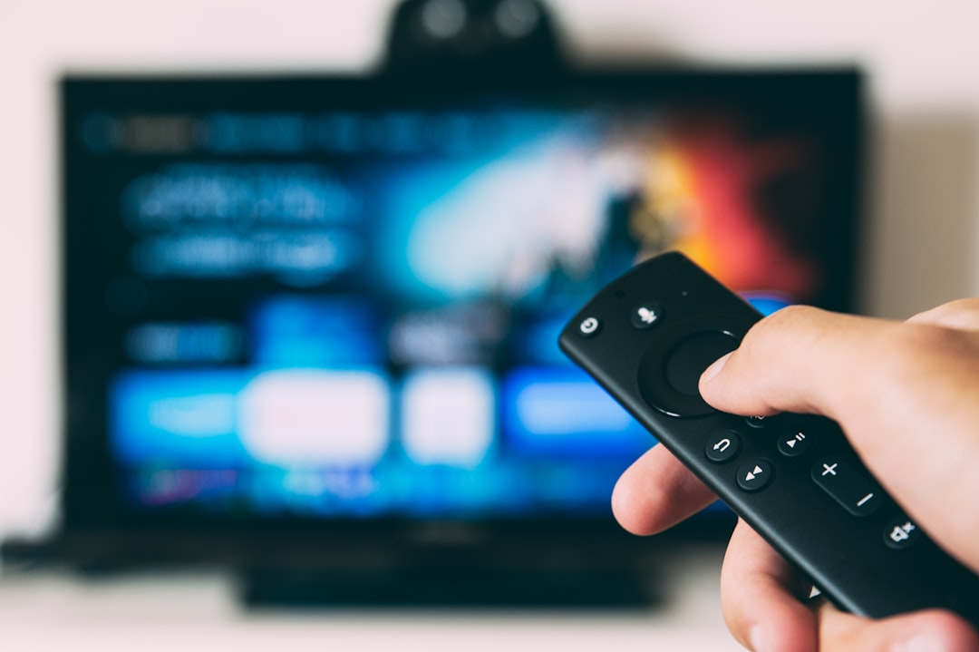 Streaming stick plugged into TV HDMI port