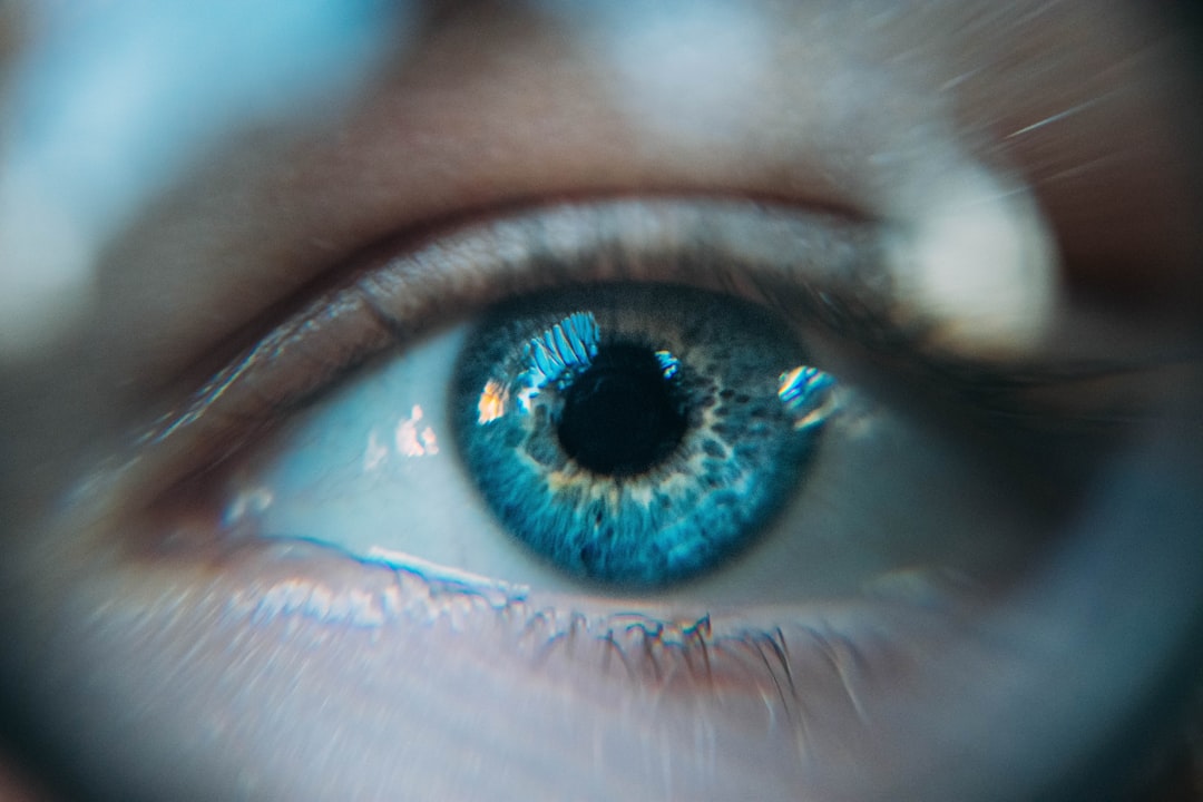 Closeup of a human eye with reflected light