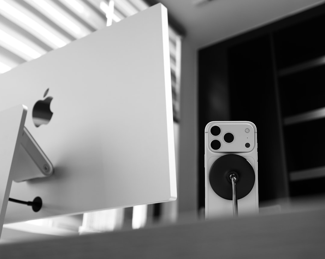 Modern workspace with multiple Apple devices on a stand