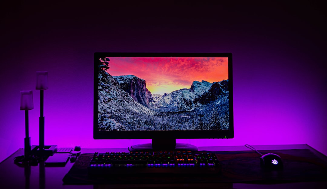 Monitor light bar illuminating desk with warm glow
