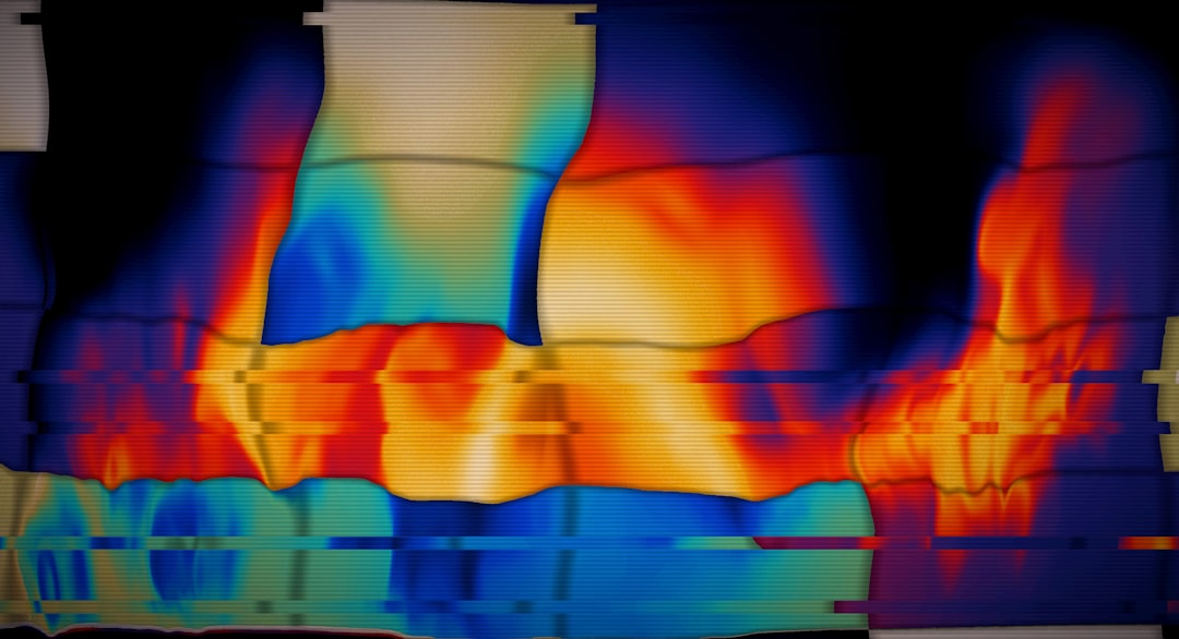 Thermal imaging camera displaying a heat map on its screen