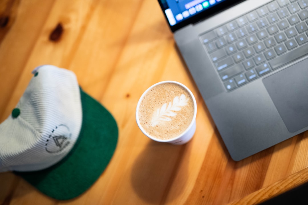Remote work laptop coffee shop travel setup