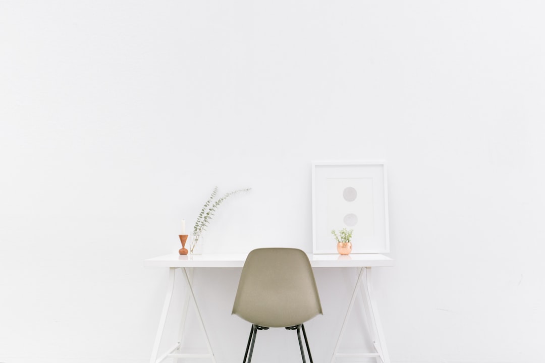 Clean minimalist standing desk setup in modern workspace