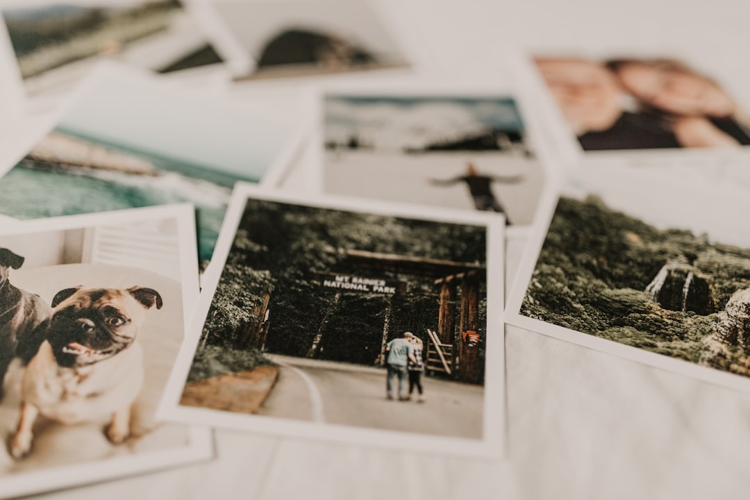 Scattered colorful printed photographs