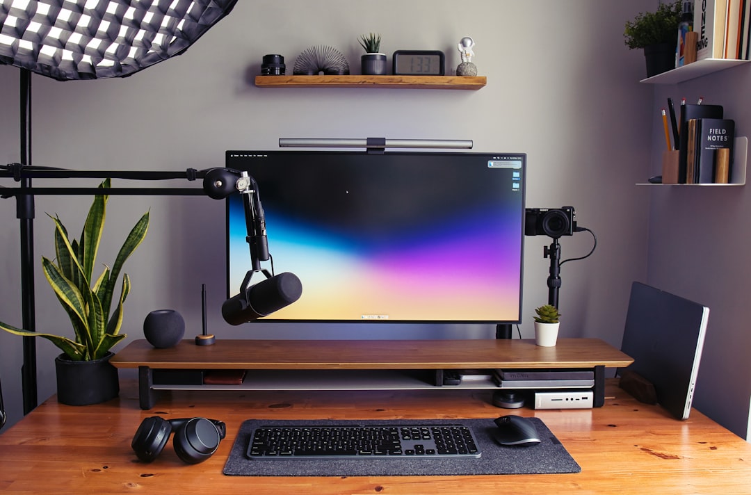 Dual monitor arm mount on standing desk