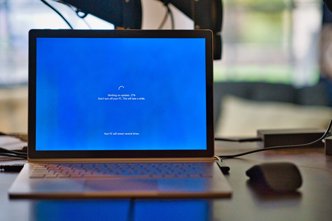 A laptop displaying a login and password prompt screen