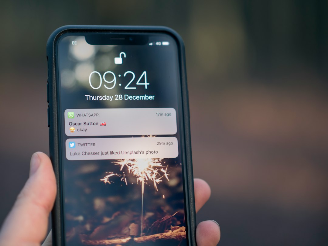 Phone lock screen showing alert notifications