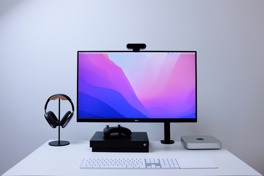 A monitor sitting on its bulky stock stand, occupying desk space