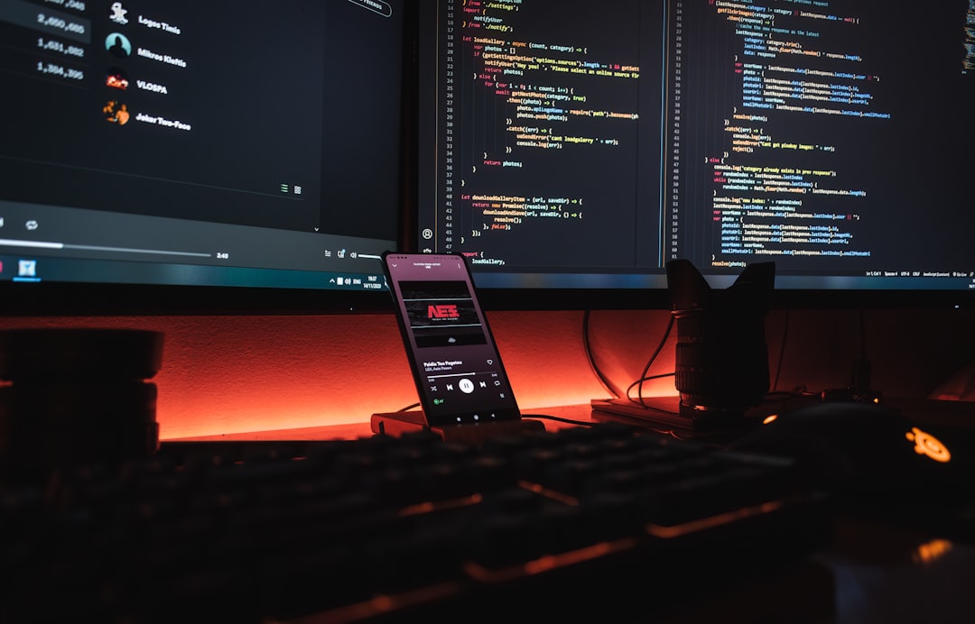 Multi-monitor desk running configuration files and camera software