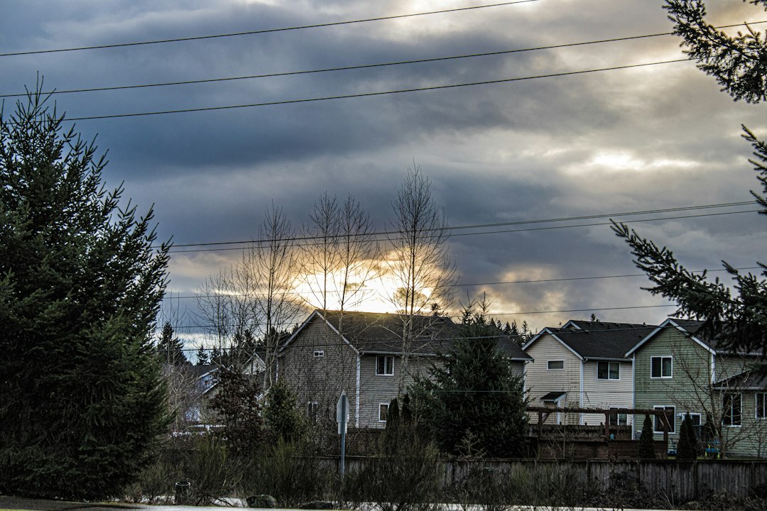 Dark storm clouds approaching a residential neighborhood
