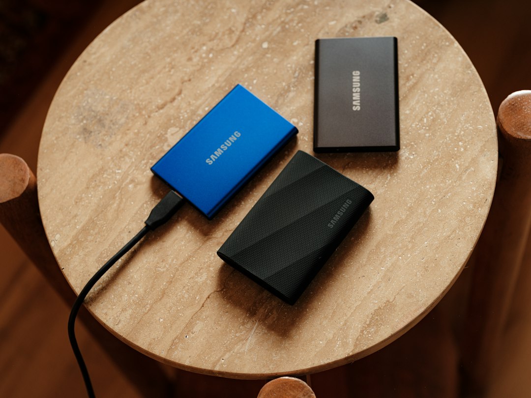 Portable SSD drives on a wooden table