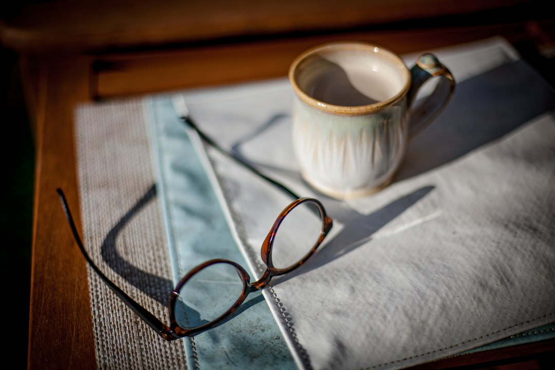 Cleaning eyeglasses with a microfiber cloth