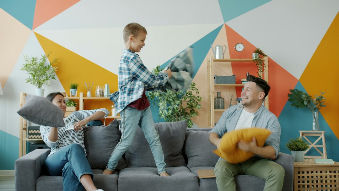 Family relaxing and laughing together in their living room