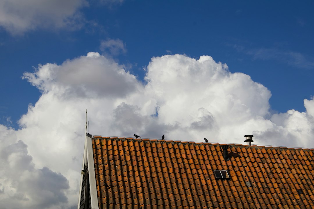 Rooftop equipment mounted against blue sky