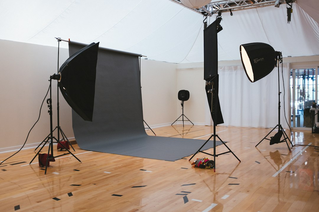Adjustable tripod stands in a studio
